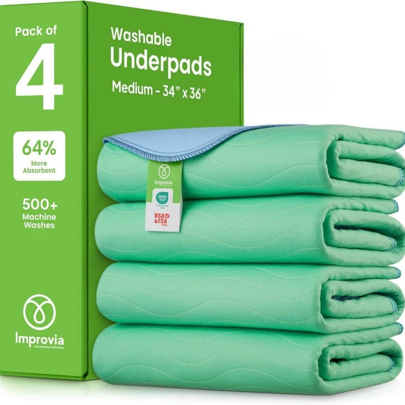 Pack of four medium washable underpads in light green color for pet training