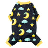 Black stretchy dog pajamas with a pattern of yellow stars and crescent moons on a light blue background
