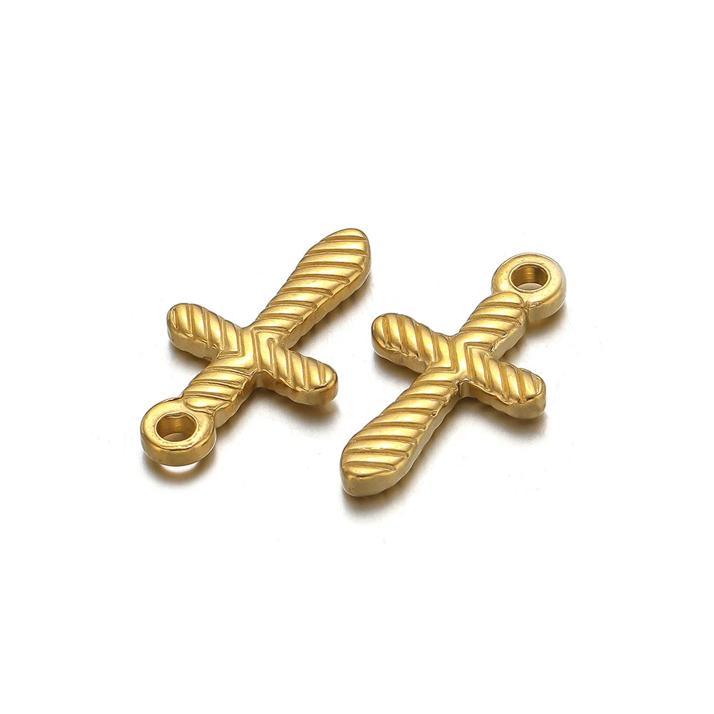 A pair of vintage gold-toned cross charms for DIY jewelry making