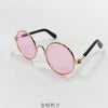 Vintage Hundesignbrille mit rosa Linsen und goldfarbenem Metallrahmen