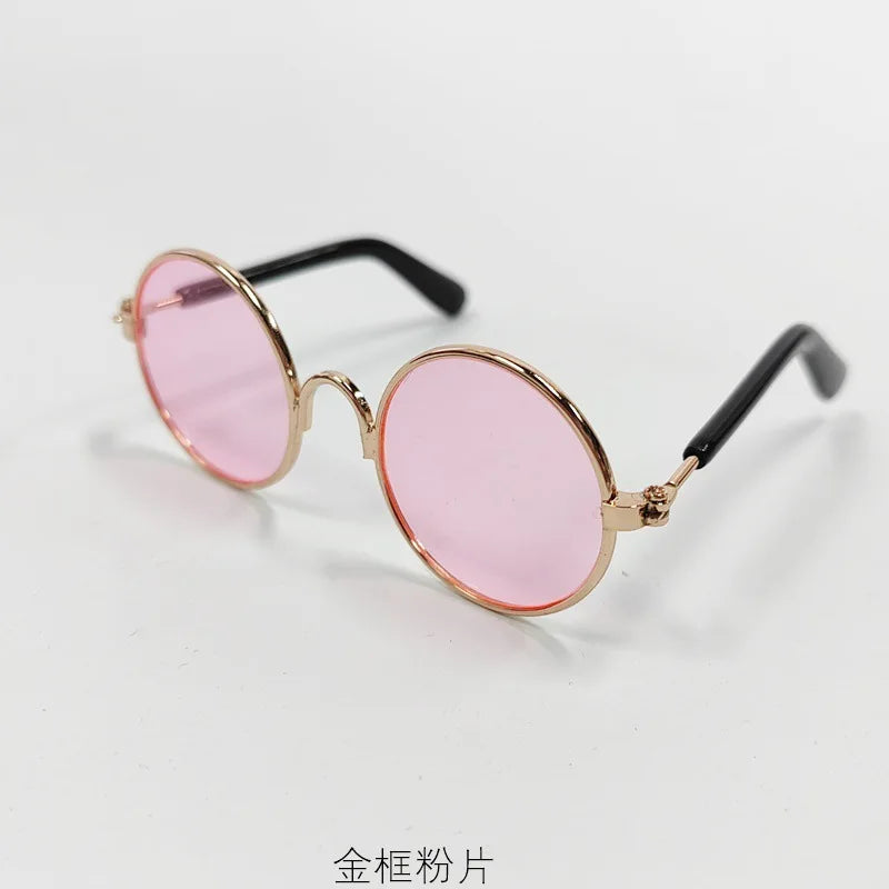 Vintage Hundesignbrille mit rosa Linsen und goldfarbenem Metallrahmen