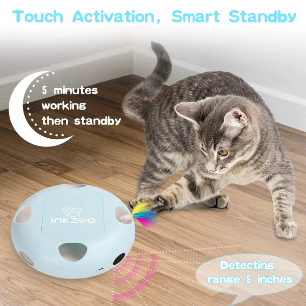A gray cat is interacting with a light blue sensor device designed for touch activation and smart standby.