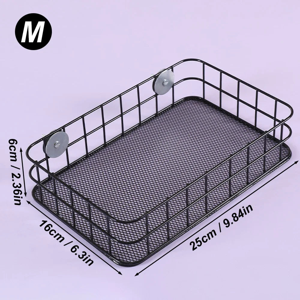 Black mesh parrot nest bed with hanging toy, measuring 25cm long and 6cm high.
