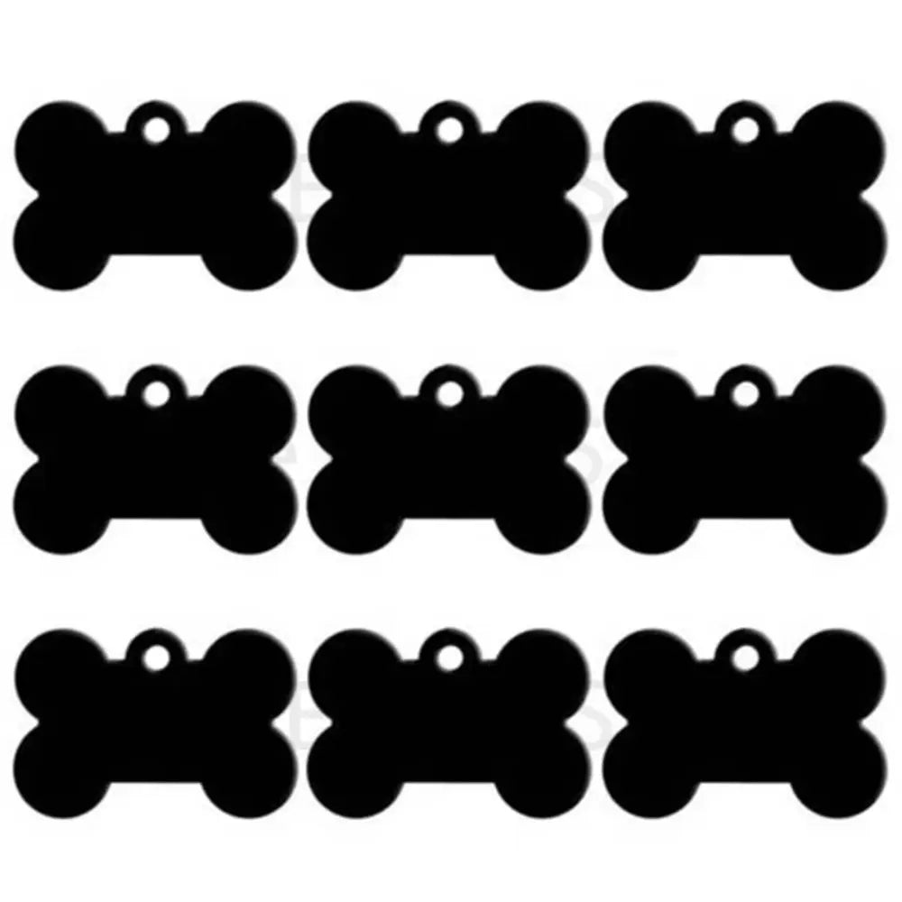 A set of black bone-shaped dog ID tags.