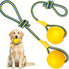 A yellow floating dog fetch toy with a rope and ball is shown next to a golden retriever.