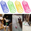 A set of colorful durable cat spring toys in various colors including blue, green, yellow, and pink.