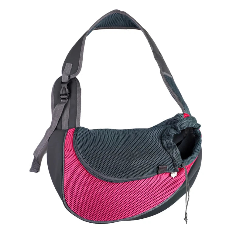 A black breathable mesh pet carrier sling with a pink accent panel.