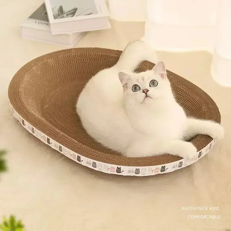 A white cat is relaxing on a brown corrugated pad for scratching and comfort.