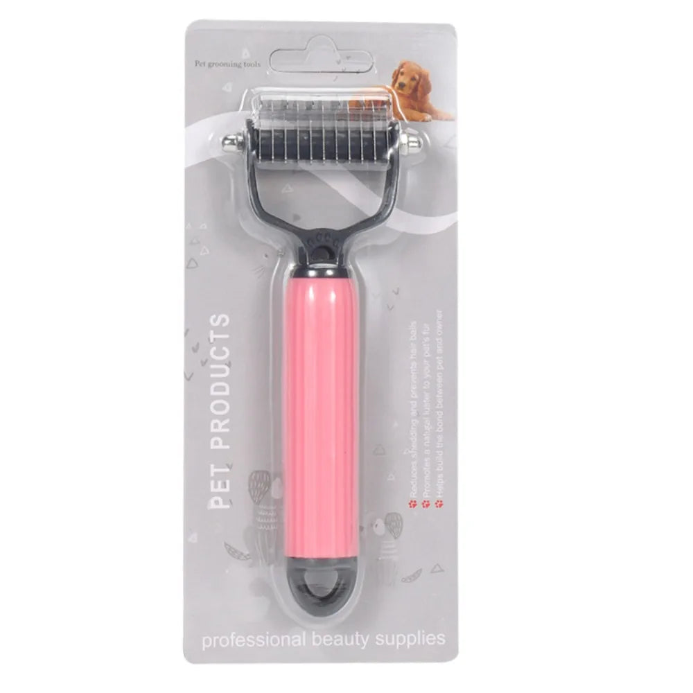 Peigne en acier inoxydable rose pour démêler les poils de chien, présenté dans un emballage transparent.