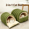 A green 2-in-1 cat bed with an entrance for a cat, resting on a light colored floor.