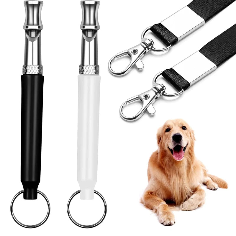 A set of adjustable ultrasonic dog whistles, including a black and silver whistle and a gold-colored dog collar.