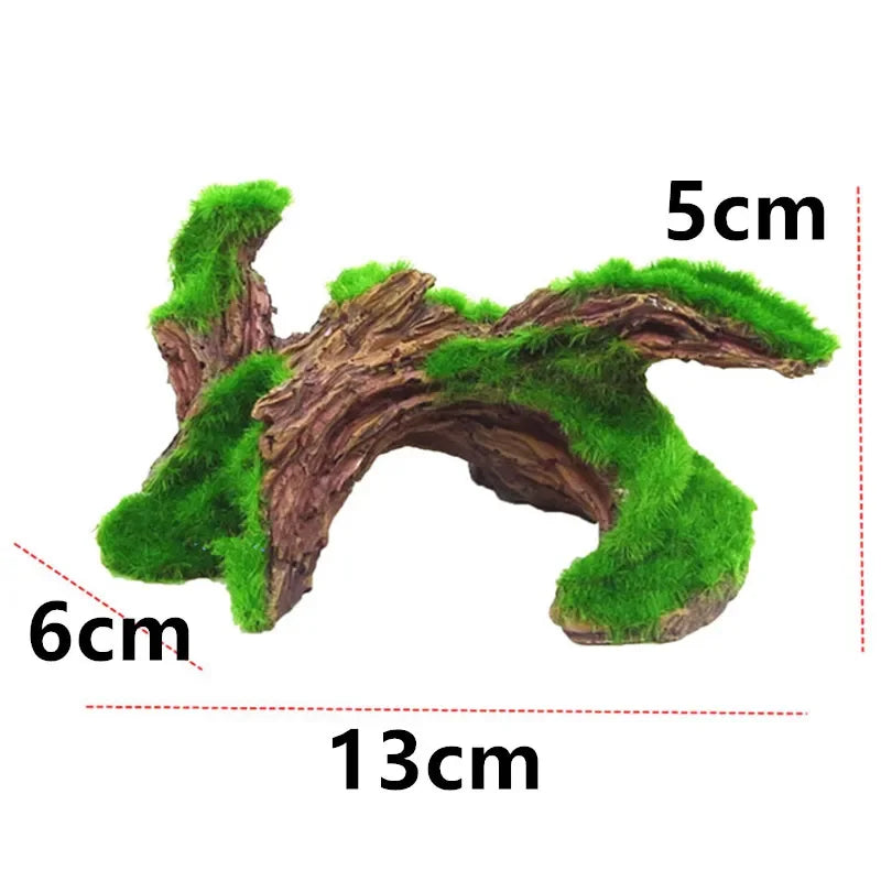 A natural wood moss root aquarium decoration with green moss growing on its surface.