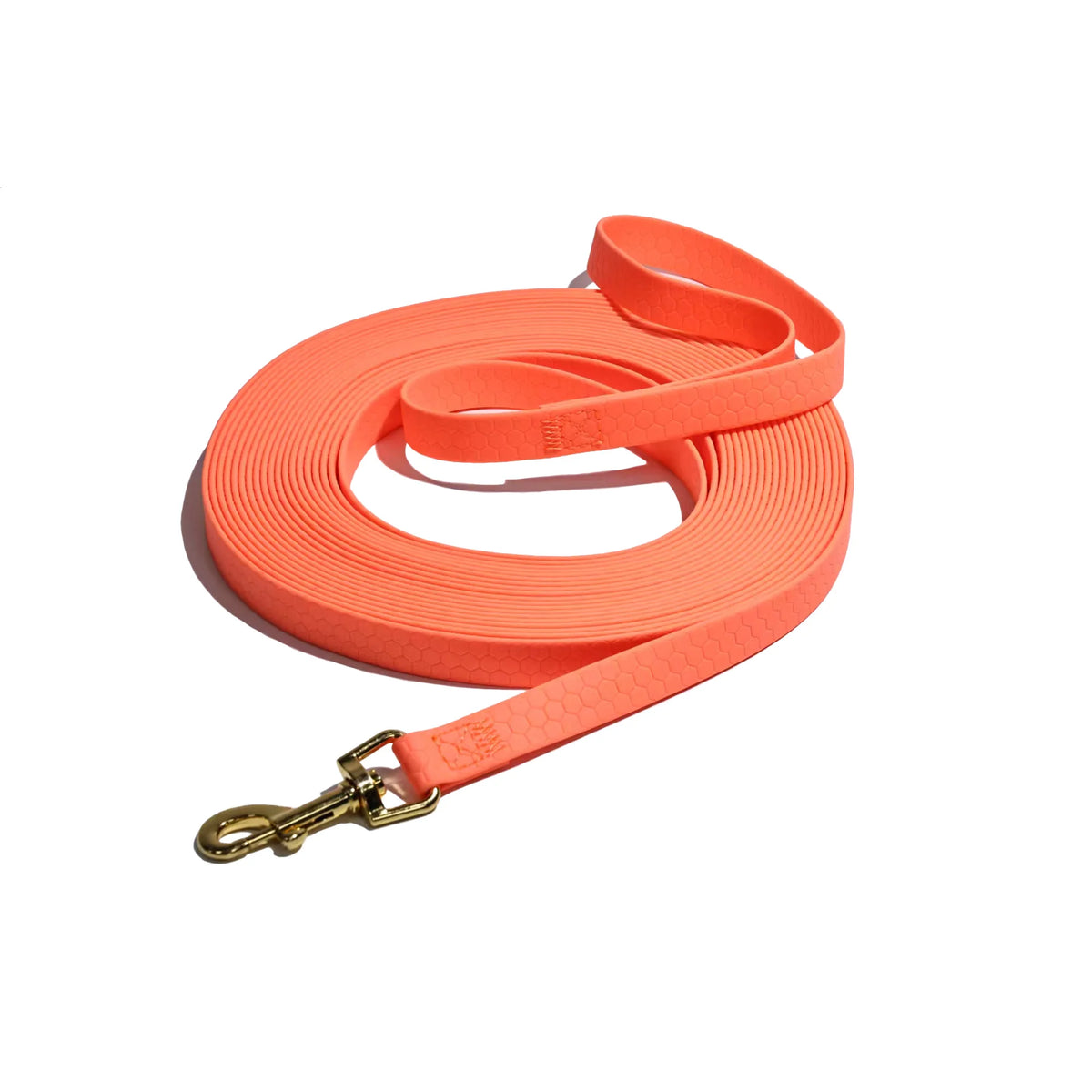Orange durable waterproof dog leash with a rustproof metal hook rolled up.