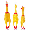 A set of three yellow rubber chicken toys for dogs, including a fetch and chew toy.