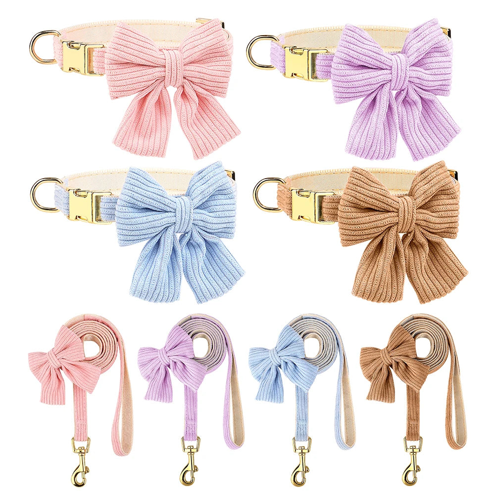 A set of velvet dog collar and leash featuring bowknot designs in pink, purple, and blue.