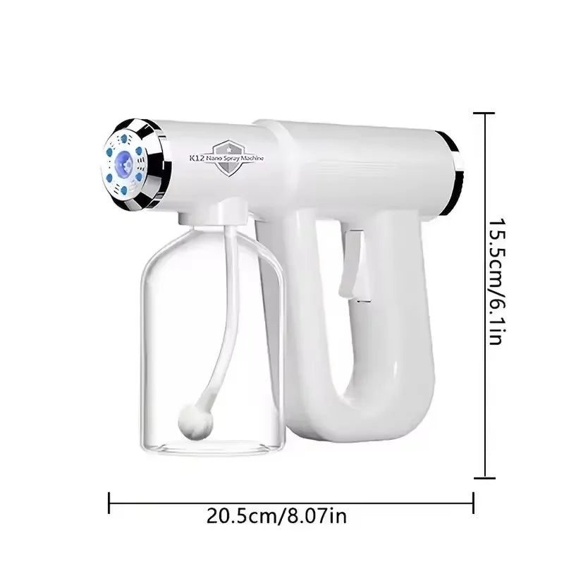 A white portable USB rechargeable nano hairspray steam gun with a clear glass bottle and a handle.