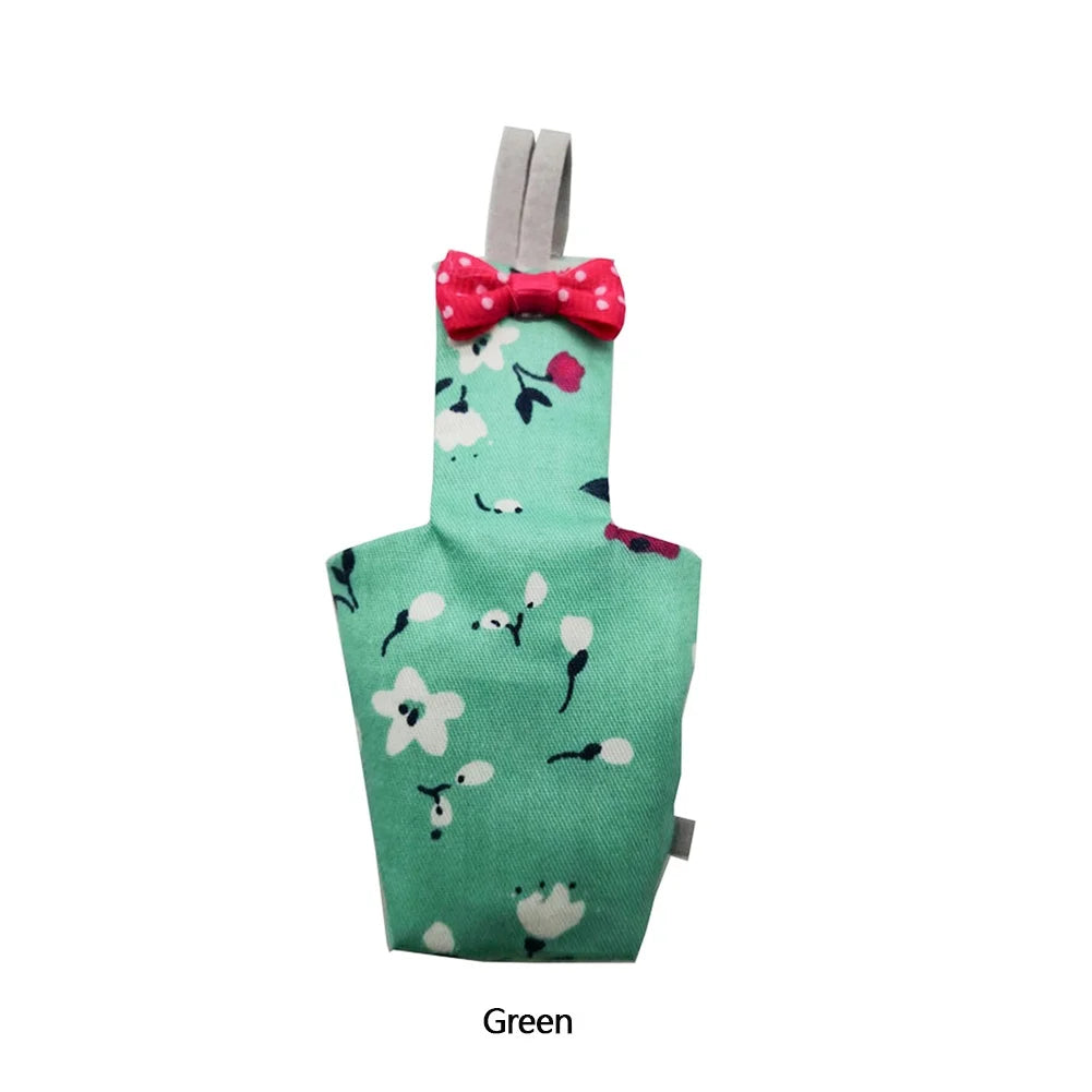 Grüner Papagei-Windschutzanzug mit rosa Schleife für Vögel