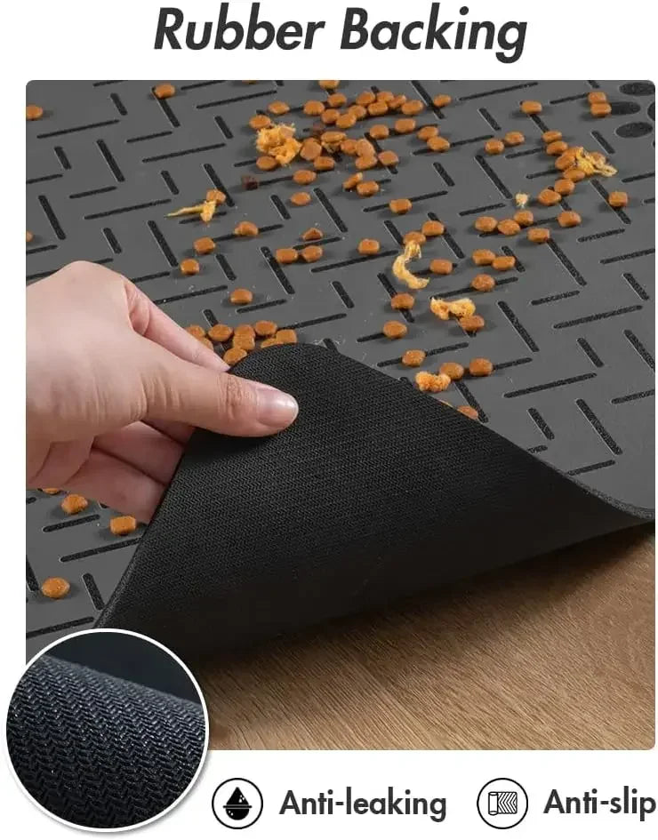 A hand places a black rubber backing onto a dark mat, demonstrating the anti-leaking and anti-slip features.