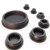 A set of dark silicone rubber hole plugs and seals for various applications.