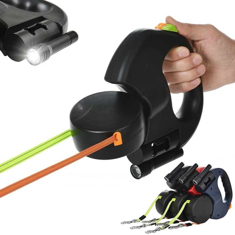 A hand holds a black retractable dog leash with an LED light and waste bag holder, showing the leash mechanism and attached l