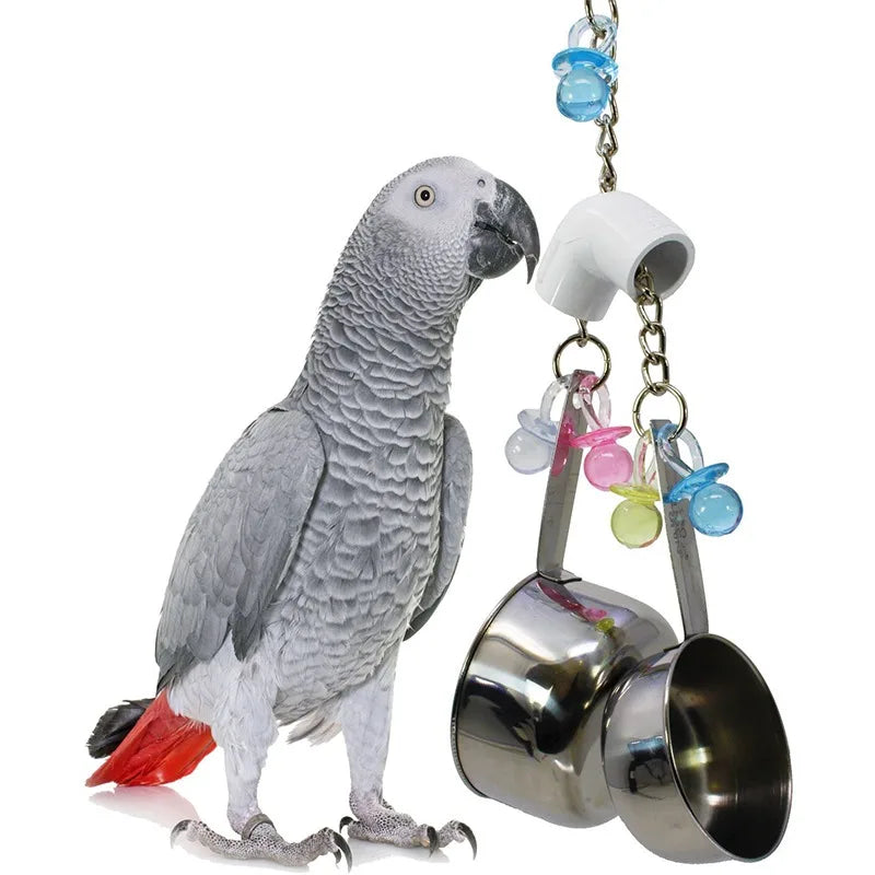 Stainless steel parrot chew toy featuring accent cups and a gray parrot figure.