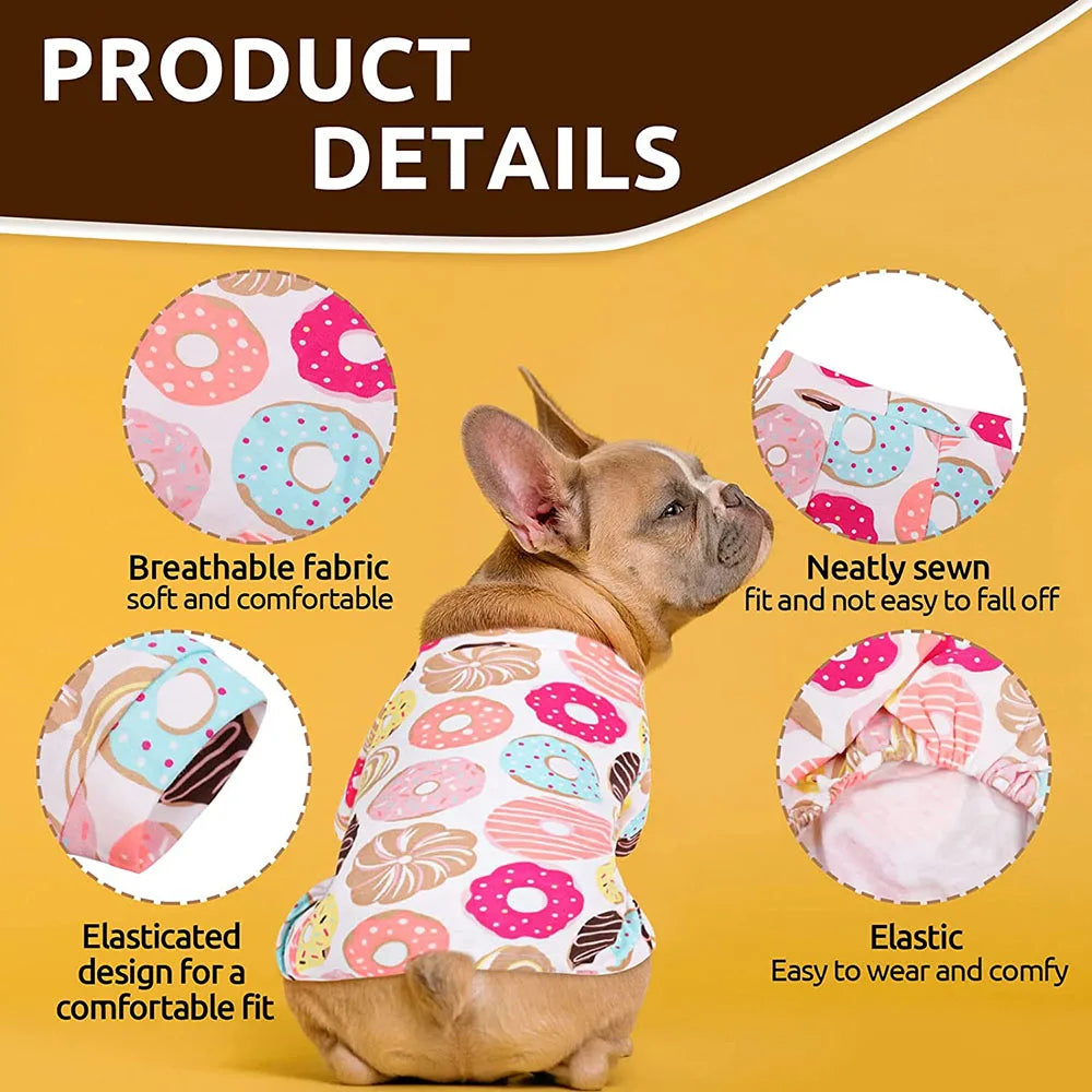 A brown dog wearing a pink patterned breathable fabric pet pajama top for dogs and cats