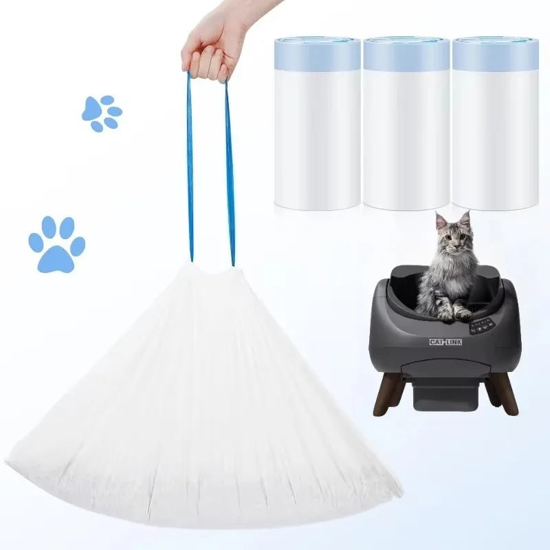 Eine weiße wiederverwendbare Katzenstreubox-Liner neben mehreren zylindrischen Linern und einer grauen Streubox.