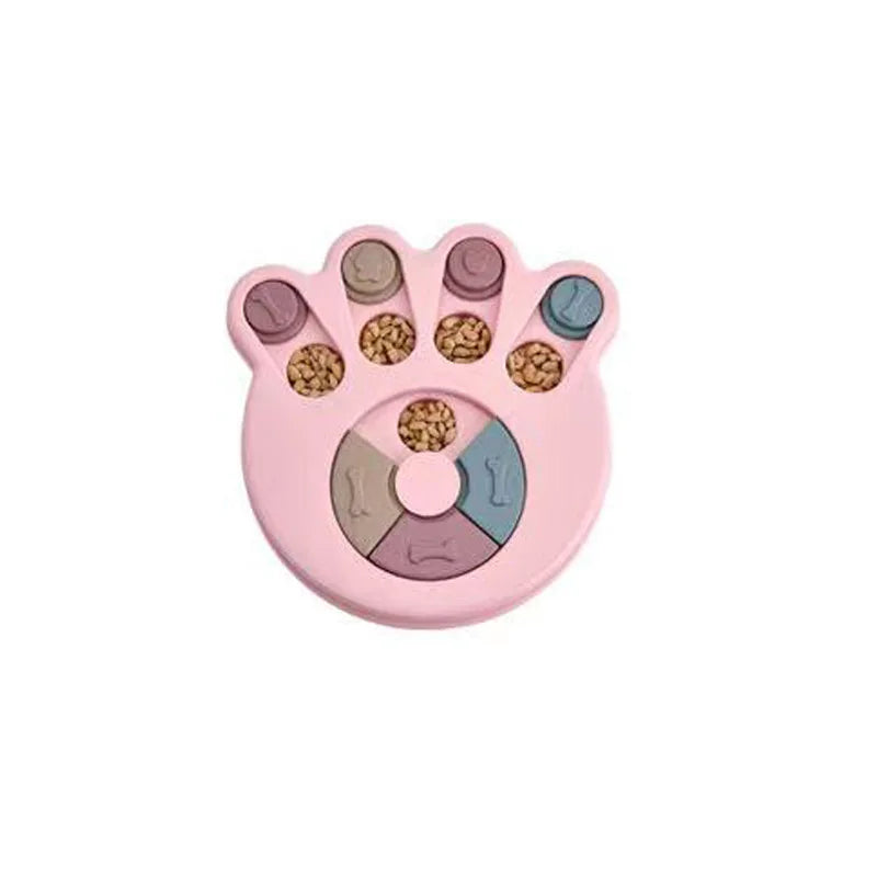 Jouet distributeur interactif rose pour chien et chat avec compartiments de tailles variées pour les friandises.