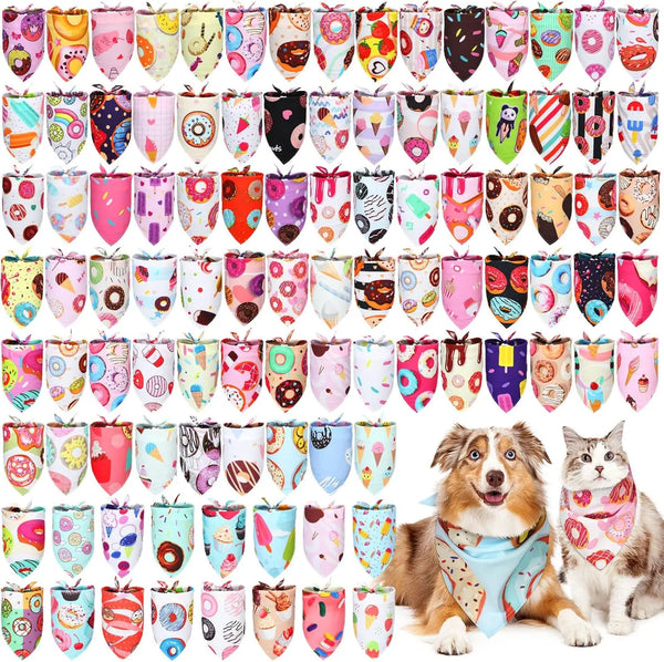 A bulk pack of 100 dog bandanas featuring various colorful donut prints and patterns.