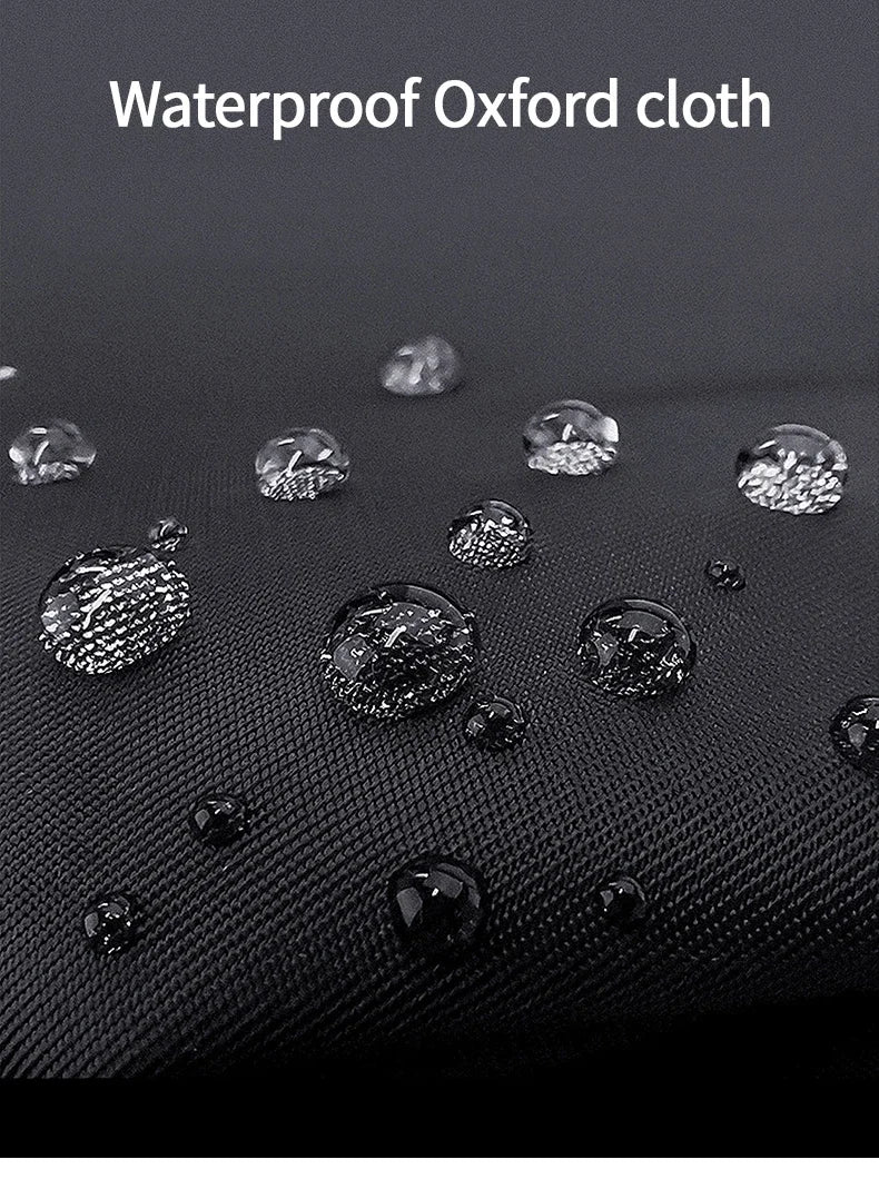 Close-up of waterproof Oxford cloth material showing various water droplets on a black surface.