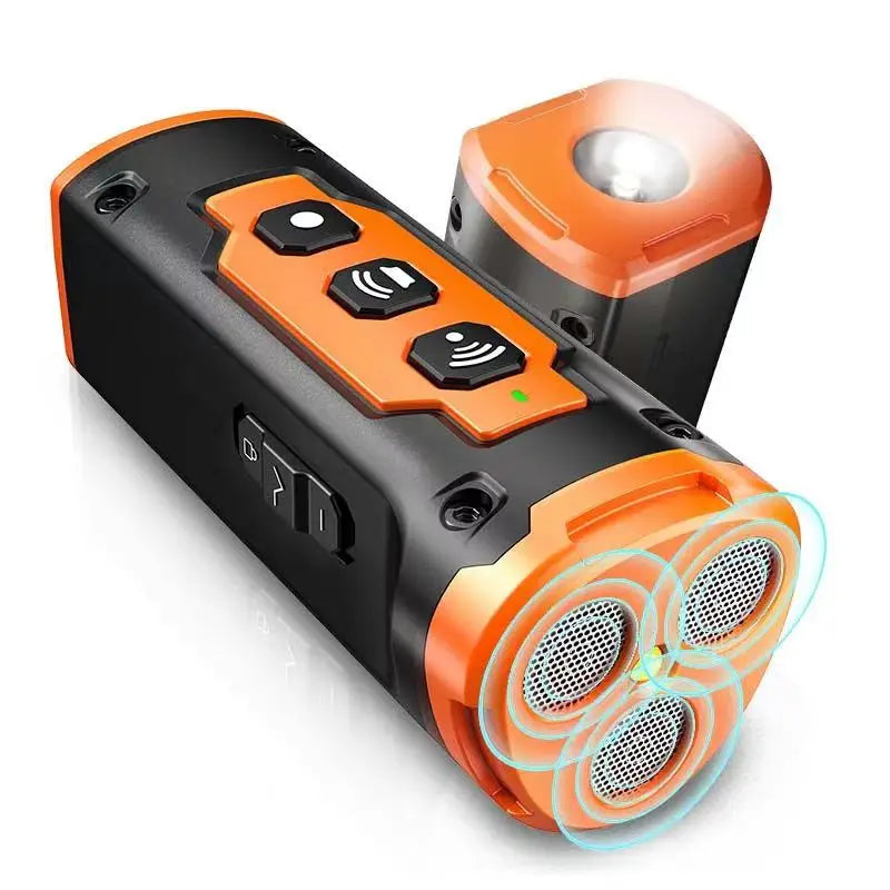 Disuasorio de ladridos caninos ultrasónico en negro y naranja, con linterna LED y altavoz perforado.