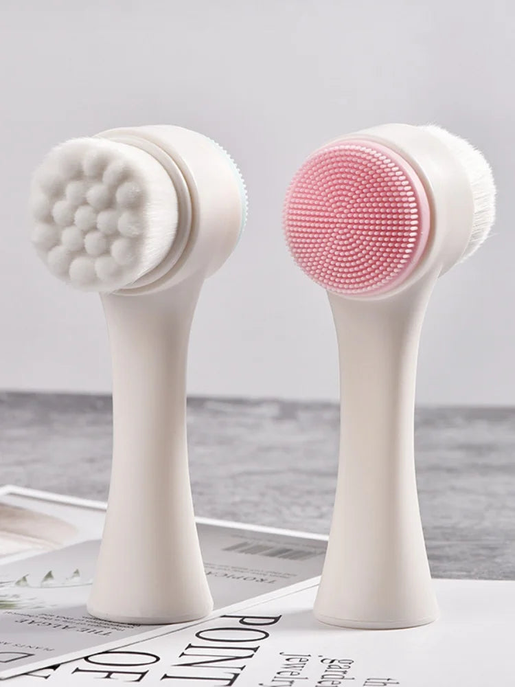 A pair of white silicone pet paw cleaners with pink and white bristles are shown against a light gray background.
