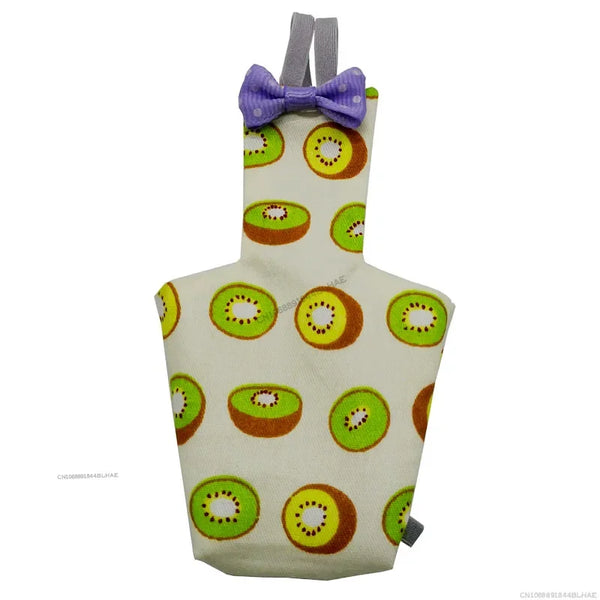 A light-colored shirt featuring a pattern of sliced kiwi fruit and a purple bow tie.