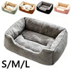 A gray plush pet bed shown in various sizes and colors, including a large S/M/L size.