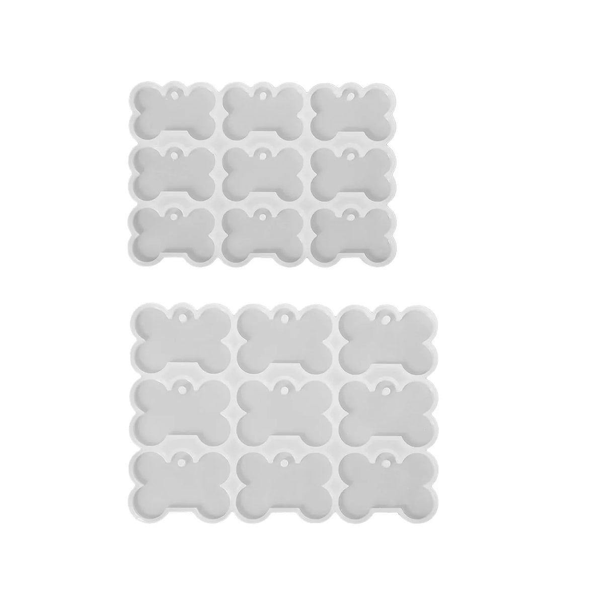 A set of silicone dog bone molds for resin casting, arranged in two rows.