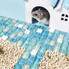 A cooling mat for small pets is shown next to a small rodent and a blue tile mat.