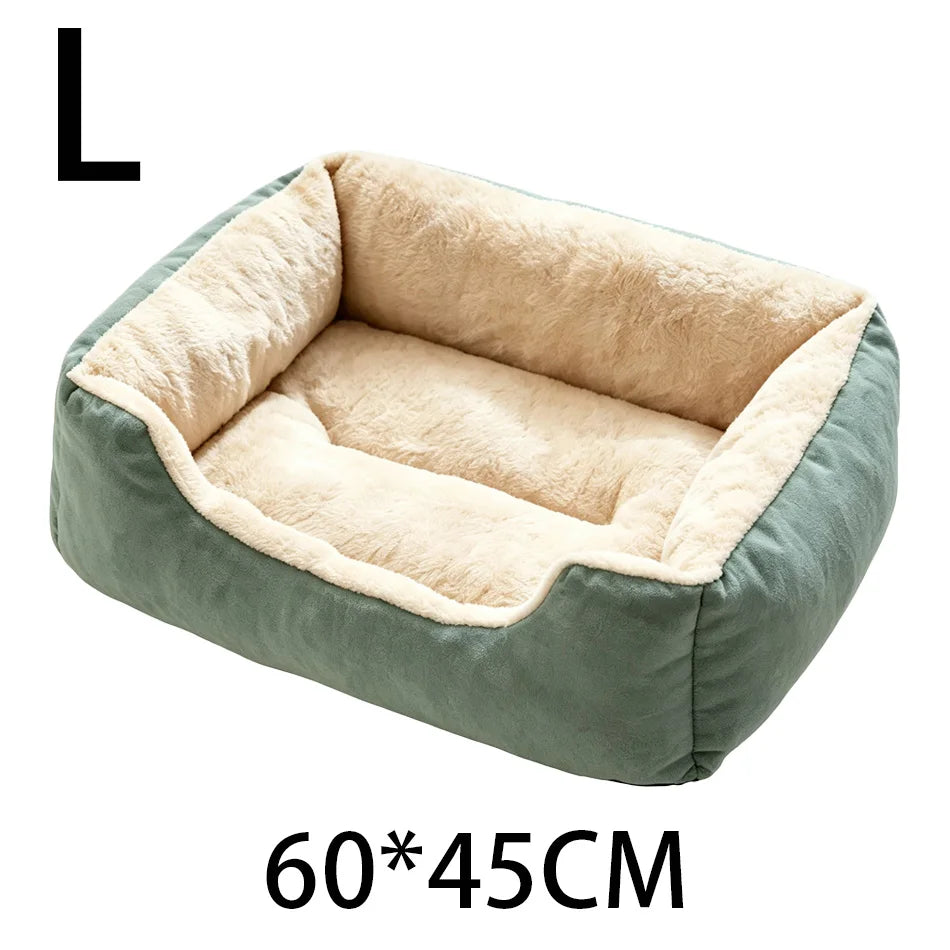 A rectangular, plush pet bed in a muted sage green color with a light beige sherpa lining.