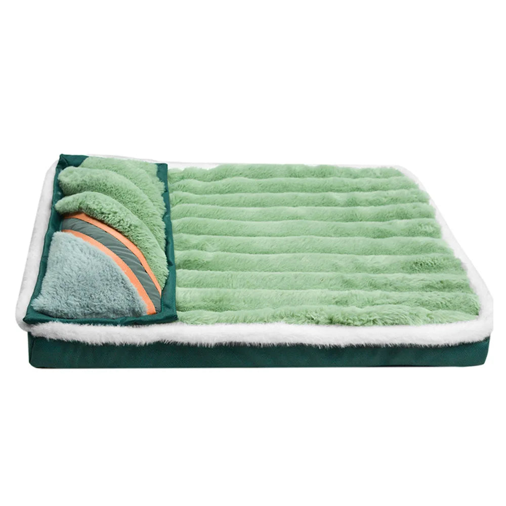 A rectangular green fleece dog bed with a detachable, fluffy gray and orange cover.
