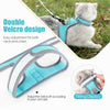 A light blue cat harness with a Velcro design is shown on a cat and a separate harness component.