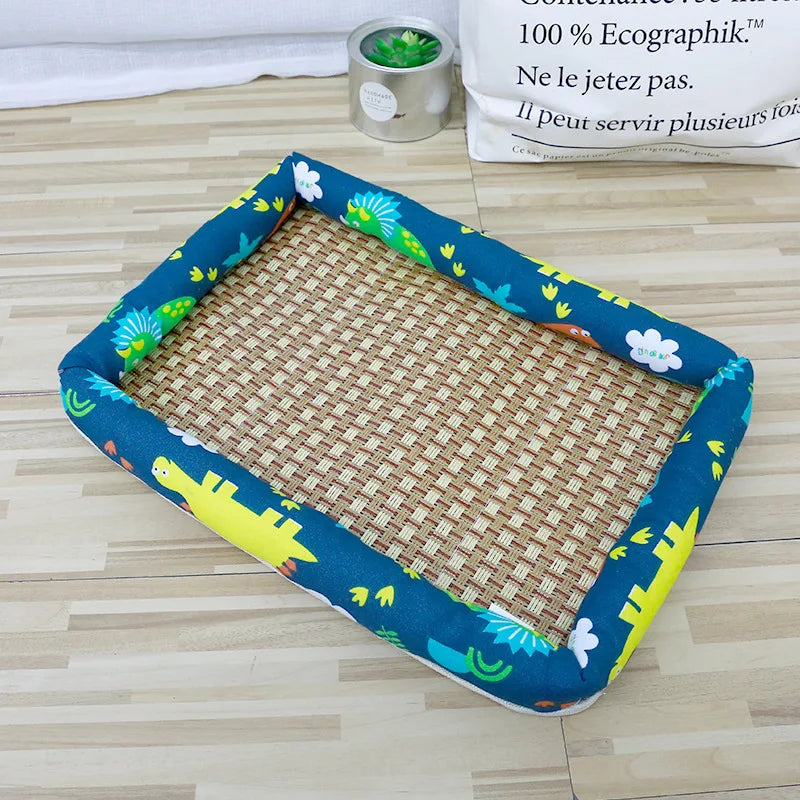 A rectangular pet bed with a blue border and a woven rattan mat is shown on a wooden floor.