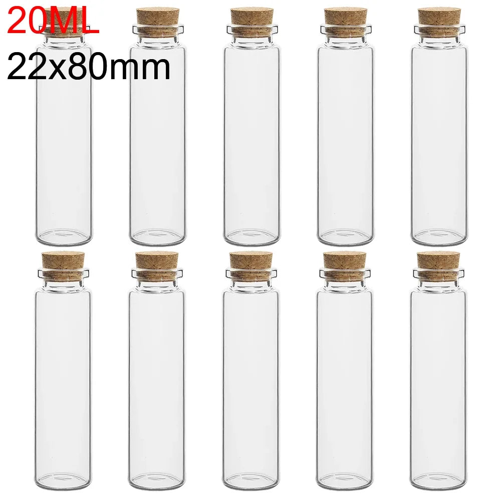 A set of ten clear glass bottles with cork stoppers, measuring 20ml and 22x80mm.