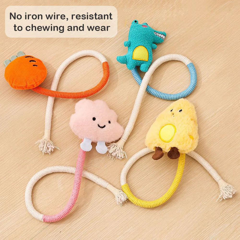Colorful cotton rope cat toys featuring various fruit shapes like an orange, a blue, and a yellow one.
