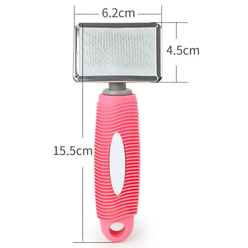 A pink silicone cat comb with stainless steel pins for gentle pet grooming.
