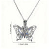 Silver butterfly ashes urn necklace with a detailed, open-winged design