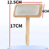 A wooden pet grooming brush with massage bristles shown against a white background.