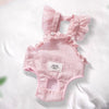 Pink ruffled dog shorts for females with a sheer fabric texture