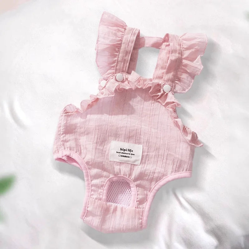 Pink ruffled dog shorts for females with a sheer fabric texture
