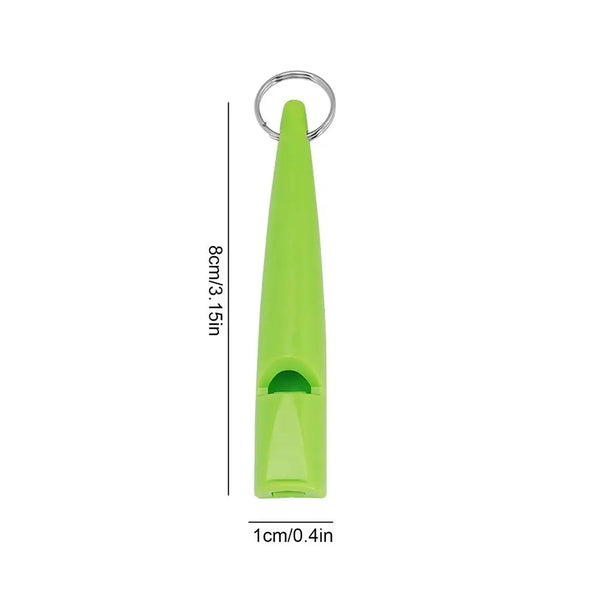 A bright lime green compact dog training whistle with a metal loop.