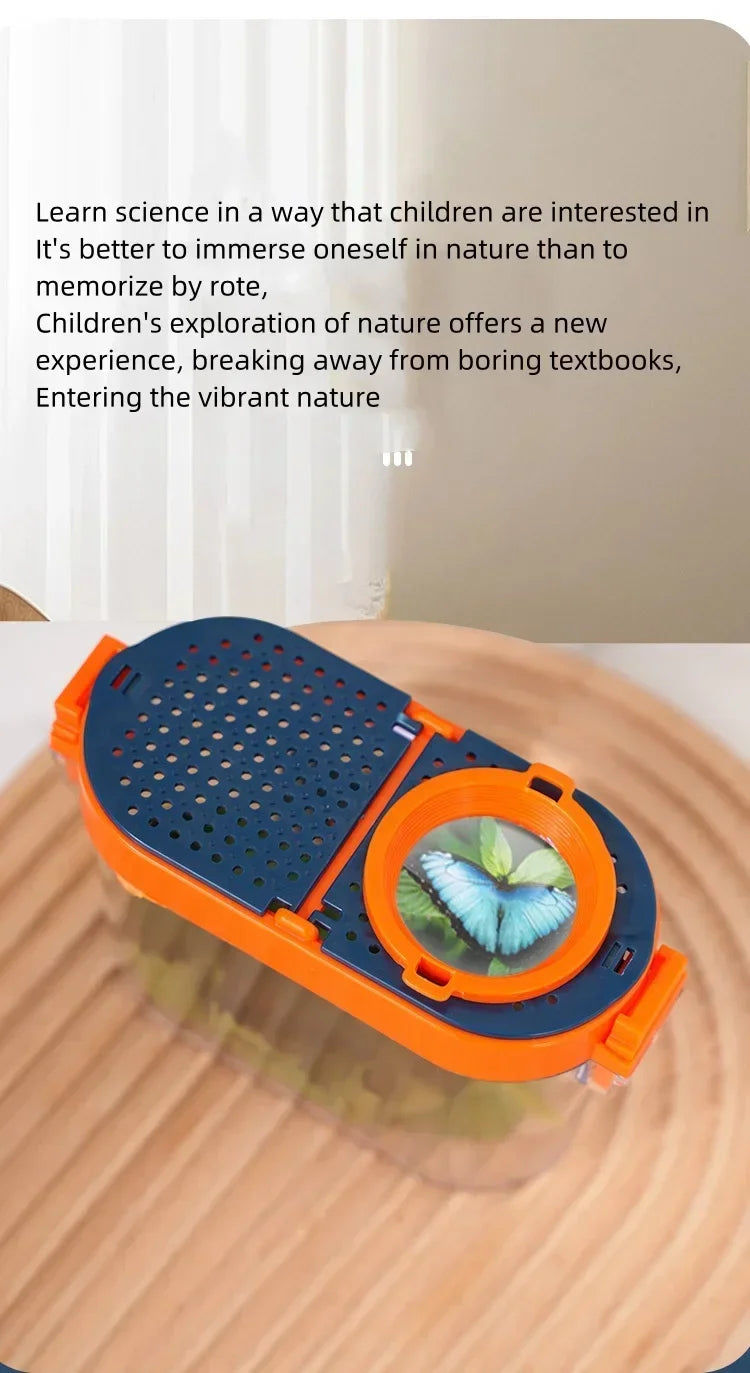 Caja de observación de insectos naranja y azul con lupa clara sobre una superficie de madera.