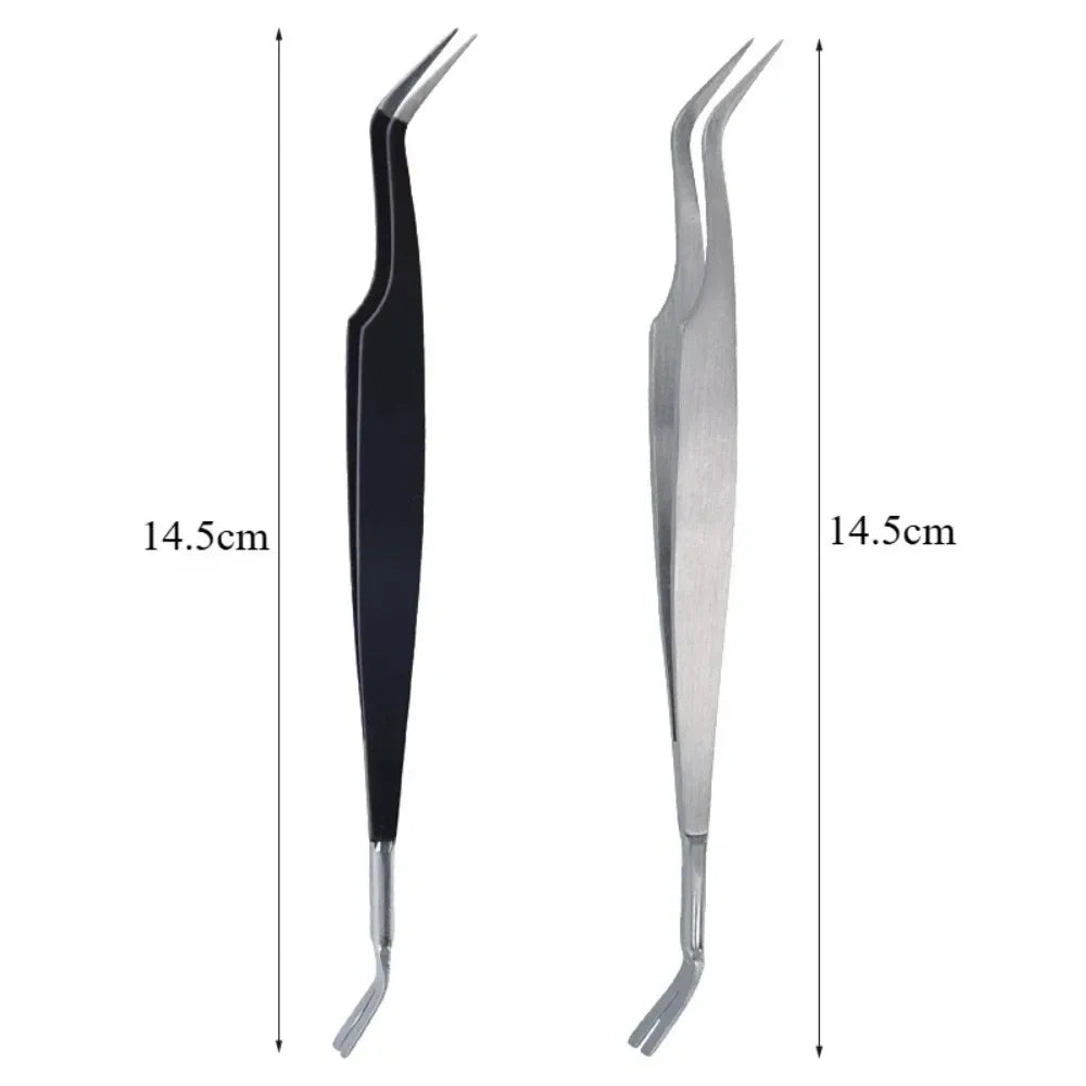Stainless steel flea and tick remover tool with a pointed tip and curved handle.